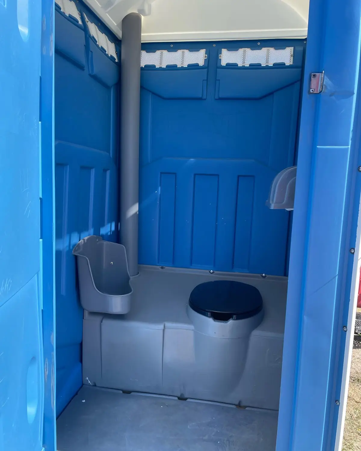 Portable toilets set for a rental like those we deliver in Kent