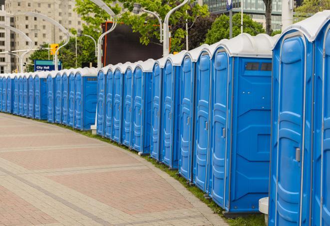 a row of portable restrooms at a fairground, offering visitors a clean and hassle-free experience in kentucky